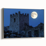 Framed canvas artwork showcasing a stunning landscape with a castle, featuring a silver frame. Ideal for home decor, adding elegance to living spaces.
