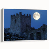 Framed canvas artwork showcasing a picturesque landscape with a majestic castle, set against a serene backdrop. The white frame enhances the vibrant colors, making it an elegant decor piece for any room.