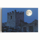 Stretched canvas artwork showcasing a vibrant landscape featuring a majestic castle surrounded by lush greenery and a serene sky, perfect for home decor.
