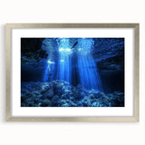 Framed landscape artwork showcasing a serene cave view, elegantly bordered with a silver mat, perfect for modern home decor and art enthusiasts.