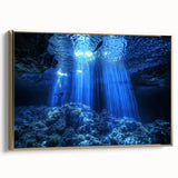 Framed canvas artwork showcasing a stunning landscape with intricate cave formations, featuring a gold accent on the frame, perfect for home decor enhancement.