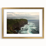 Elegant gold-framed landscape artwork depicting dramatic cliffs and serene natural scenery. The mat adds depth, enhancing home decor aesthetics. Ideal for art enthusiasts.