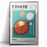 Mid-century modernist art depicting assorted food dishes in vibrant colors on a silver-framed acrylic print.