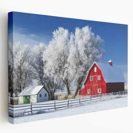 Landscape barn canvas artwork showcasing a rustic red barn surrounded by vibrant green fields and a clear blue sky, perfect for home decor. This stretched canvas adds a warm, countryside touch to any room.