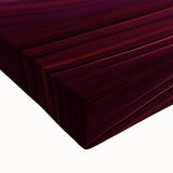 Close-up of a vibrant landscape canvas print showcasing colorful canyons with intricate details and textures, ideal for enhancing modern home decor.