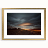 Elegant gold-framed landscape print of a serene countryside scene, showcasing lush green fields and a blue sky, perfect for home decor or art collection.