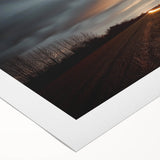 Rolled canvas artwork showcasing a serene countryside landscape with vibrant green fields and a clear blue sky, elegantly packaged in a protective tube for safe delivery. This piece adds a touch of nature-inspired decor to any space.