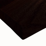 Close-up of a stretched canvas landscape artwork depicting a serene countryside scene with vibrant greens and soft blue skies, perfect for home decor.