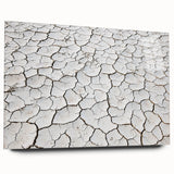 Acrylic glass artwork showcasing a stunning desert landscape in warm earthy tones, framed elegantly for a modern aesthetic. Perfect for enhancing home decor.