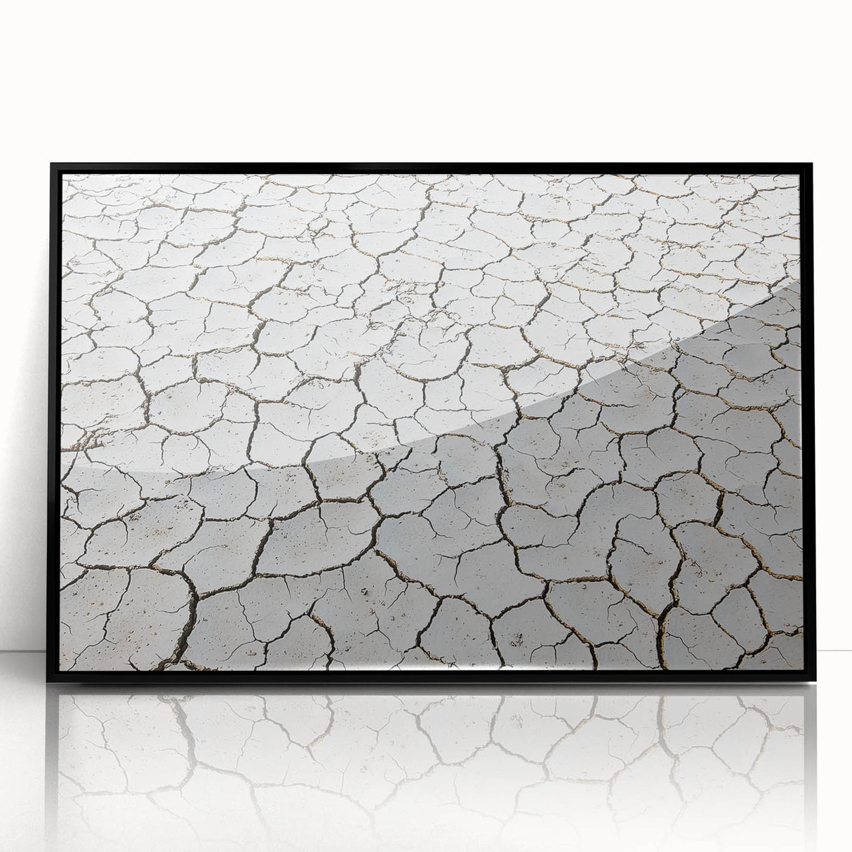 Framed acrylic artwork showcasing a vibrant desert landscape, featuring warm hues of orange and yellow with a sleek black frame, perfect for modern home decor.