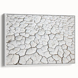 Framed canvas artwork depicting a serene desert landscape with soft, warm colors and intricate details, ideal for enhancing home decor in modern or rustic settings.