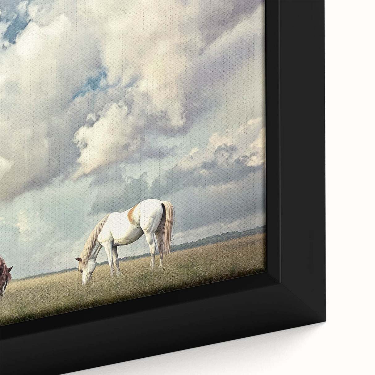 Close-up of a framed canvas depicting a serene landscape with lush green fields and a clear blue sky, ideal for home decor and nature enthusiasts.