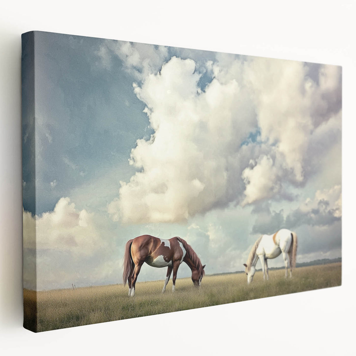 Stretched canvas artwork depicting vibrant landscapes with rolling fields in shades of green and gold, showcasing a serene countryside view suitable for home decor.