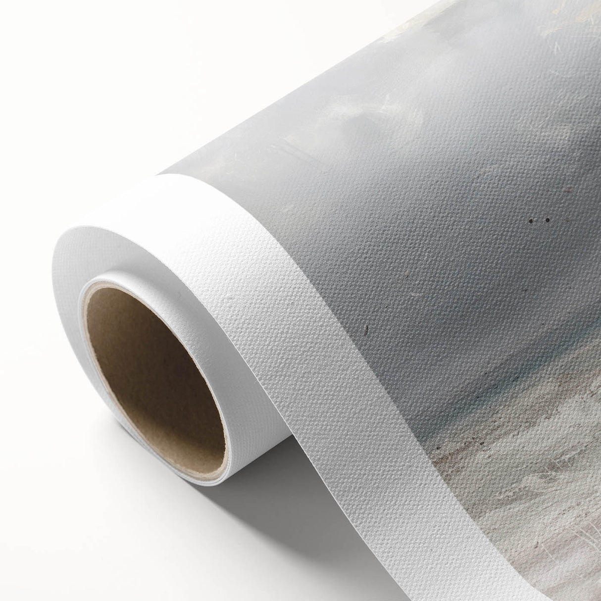 Rolled canvas showcasing a vibrant landscape artwork with rich colors and intricate details, carefully packaged in a protective cardboard tube for safe shipping.