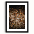 Abstract art print featuring swirling autumn hues on a black framed canvas, suitable for bedroom or dining room decor.