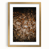 Textured abstract art print depicting autumn hues on a framed canvas, ideal for bedroom wall decor.