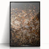 Large abstract wall art depicting autumnal trees in warm orange and red tones on a black framed acrylic print.