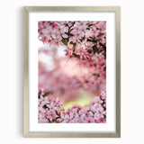 Textured abstract art print in soft pastel hues on a silver-framed canvas, ideal for bedroom wall decor.