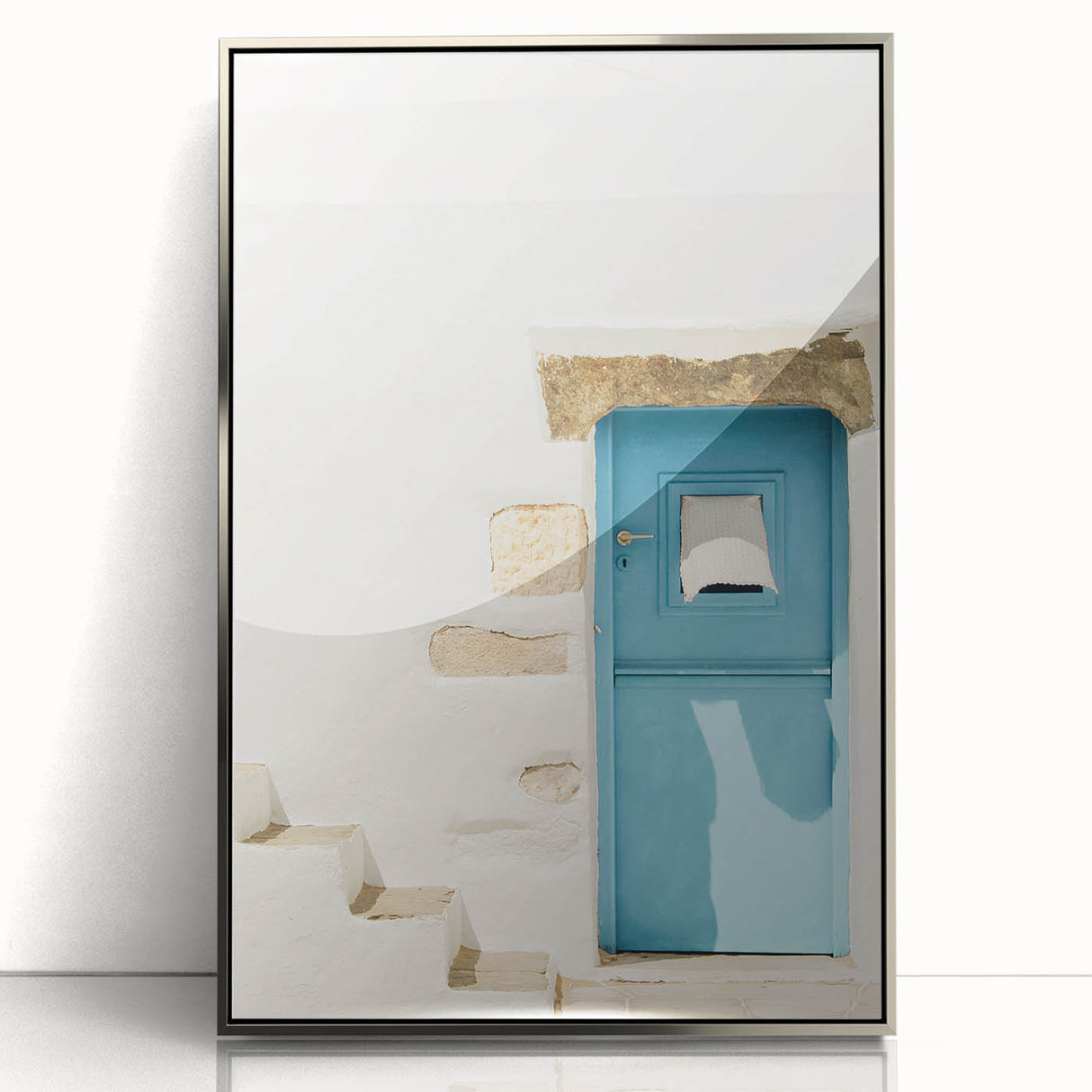 Mid-century modernist art featuring geometric shapes in pastel colors on a silver-framed acrylic print.