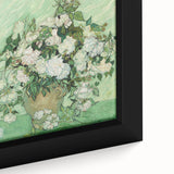 Close-up of a framed canvas featuring a textured, colorful abstract design on a black background.