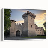 Framed canvas artwork depicting a serene landscape with a castle in a lush green setting, featuring a white frame and side view display, perfect for home decor.