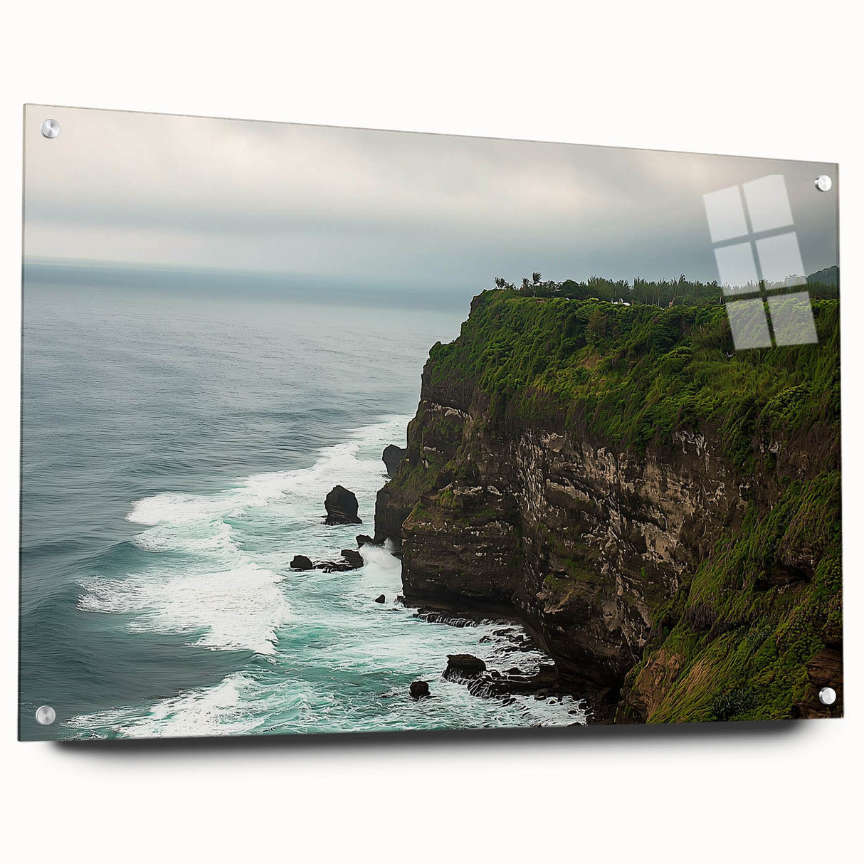 Acrylic glass artwork depicting a scenic cliff landscape, showcasing vibrant colors and intricate details, framed with stylish pins for modern decor enhancement.