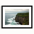 Elegant black-framed landscape artwork showcasing dramatic cliffs, enhanced by a mat for a polished finish, perfect for home decor or office settings.
