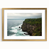 Framed landscape artwork depicting majestic cliffs with a gold mat, showcasing intricate details and vibrant colors, ideal for enhancing home decor.