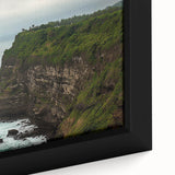 Framed canvas artwork showcasing a vibrant landscape of dramatic cliffs and serene sea views, highlighting rich colors and textures for an artistic home decor accent.