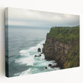 Stretched canvas artwork depicting a dramatic cliff landscape in vibrant colors, showcasing rugged terrain and lush greenery, perfect for enhancing any living space or office decor.