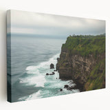 Stretched canvas artwork depicting a dramatic cliff landscape in vibrant colors, showcasing rugged terrain and lush greenery, perfect for enhancing any living space or office decor.