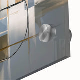 Close-up of a vibrant abstract geometric design on acrylic glass, showcasing intricate patterns in shades of blue, yellow, and white, perfect for modern decor.