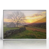 White barn-framed acrylic wall art showcasing a serene landscape scene, featuring vibrant colors and intricate details, perfect for enhancing home decor.