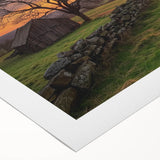 Rolled canvas showcasing a vibrant landscape barn design, featuring rich colors and textured details, securely packaged in a protective cardboard tube for shipping. Perfect for enhancing rustic home decor.