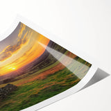 Rolled print showcasing a vibrant landscape barn scene with rich colors and intricate details, elegantly packaged in a protective cardboard tube for easy storage.