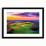Black framed landscape art print featuring a serene countryside scene with lush greenery and a clear blue sky, elegantly matted for a polished finish.