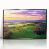 Framed acrylic artwork showcasing a serene countryside landscape with rolling hills and lush greenery, set in a stylish silver frame, ideal for home decor.