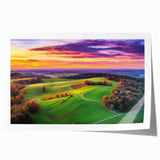 Vibrant countryside landscape rolled print showcasing rolling hills, lush greenery, and a serene sky, packaged securely in a protective cardboard tube for easy transport.