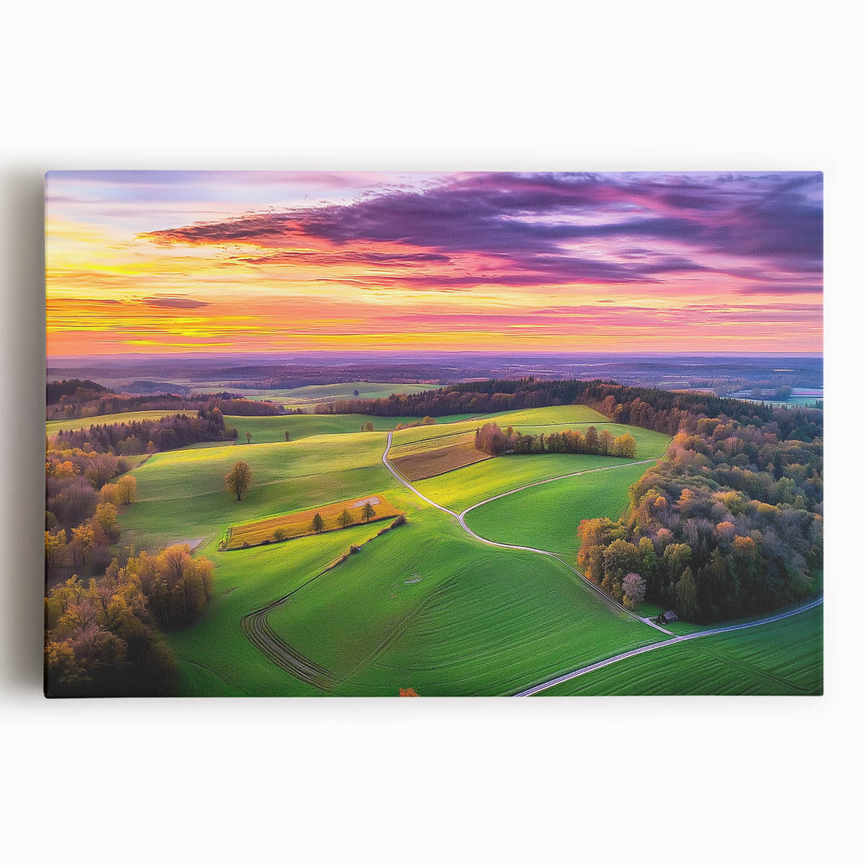 Stretched canvas artwork depicting a serene countryside landscape with rolling hills, vibrant greenery, and a tranquil sky, ideal for home decor and nature lovers.