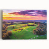 Stretched canvas artwork depicting a serene countryside landscape with rolling hills, vibrant greenery, and a tranquil sky, ideal for home decor and nature lovers.