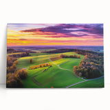 Stretched canvas artwork showcasing a serene countryside landscape with rolling hills and vibrant greenery, perfect for home decor or art enthusiasts.