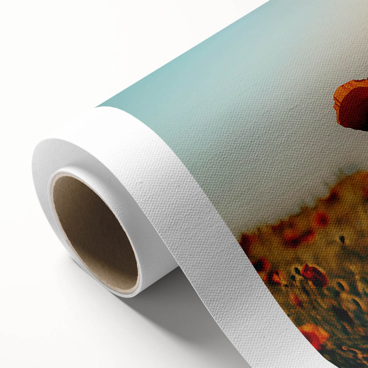 Vibrant rolled canvas artwork showcasing a serene landscape of lush green fields under a bright blue sky, elegantly packaged in a durable cardboard tube for protection.