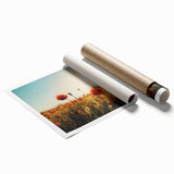 Vibrant landscape art print showcasing rolling green fields under a bright blue sky, elegantly rolled and packaged in a protective tube for easy transport.