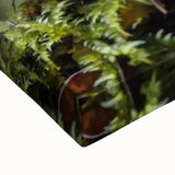 Large art of a black and white landscape painting on stretched canvas, featuring detailed floral elements.