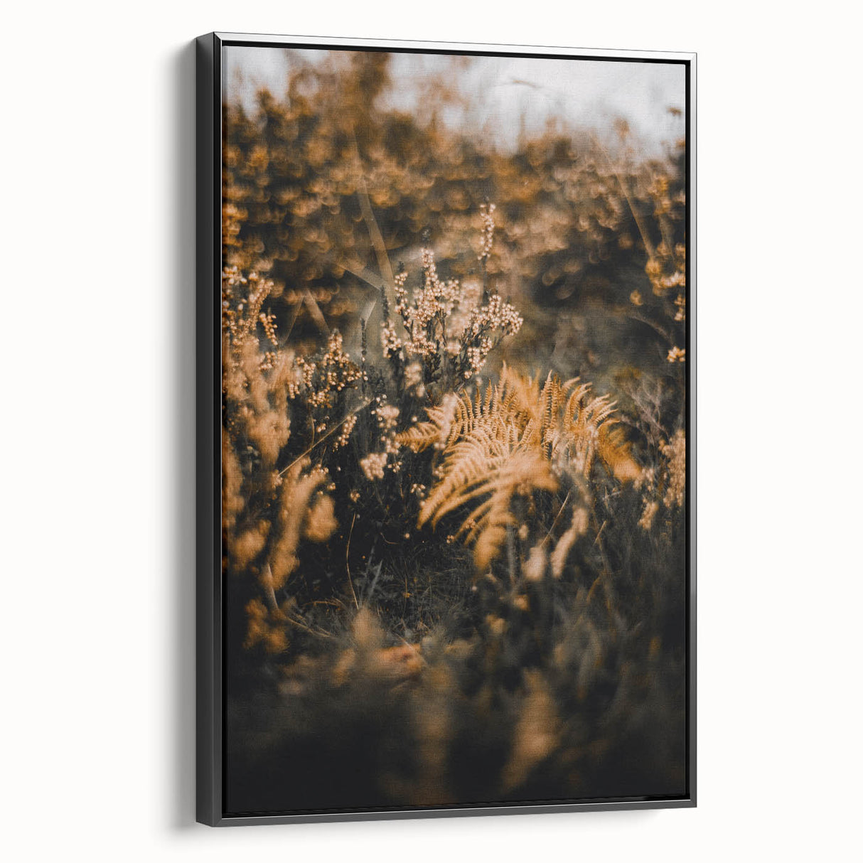 Black and white wall art featuring a vintage poster-style landscape painting on a framed canvas, ideal for bedroom decor.