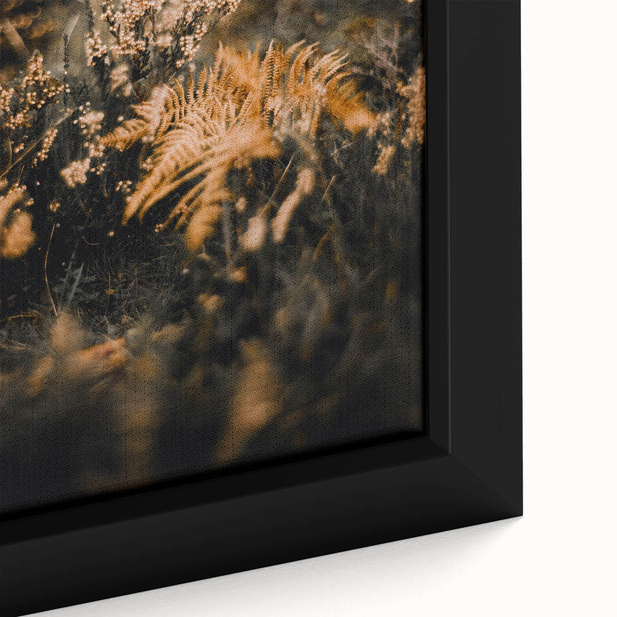 Close-up of a black wall art canvas featuring a textured, colorful abstract design, ideal for living room decor.