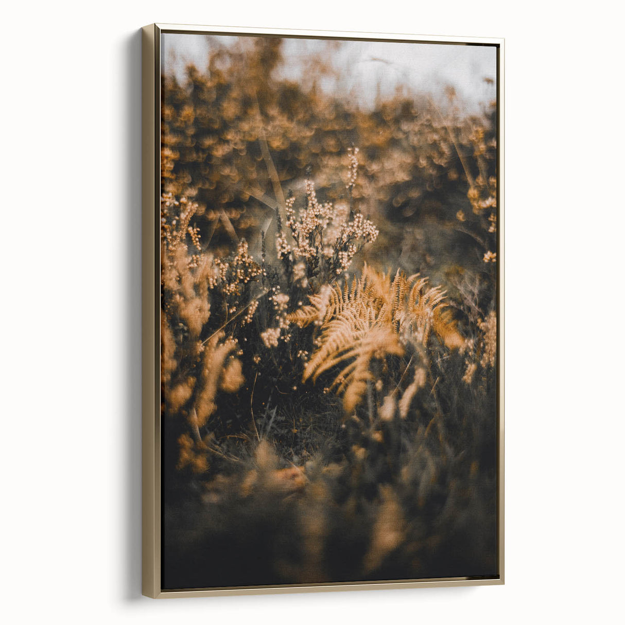 Framed canvas featuring a vintage-style landscape with autumn trees in gold and black tones, ideal for bedroom wall art.