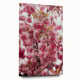 Large abstract wall art on acrylic glass depicting spring themes in vibrant green and pink tones.
