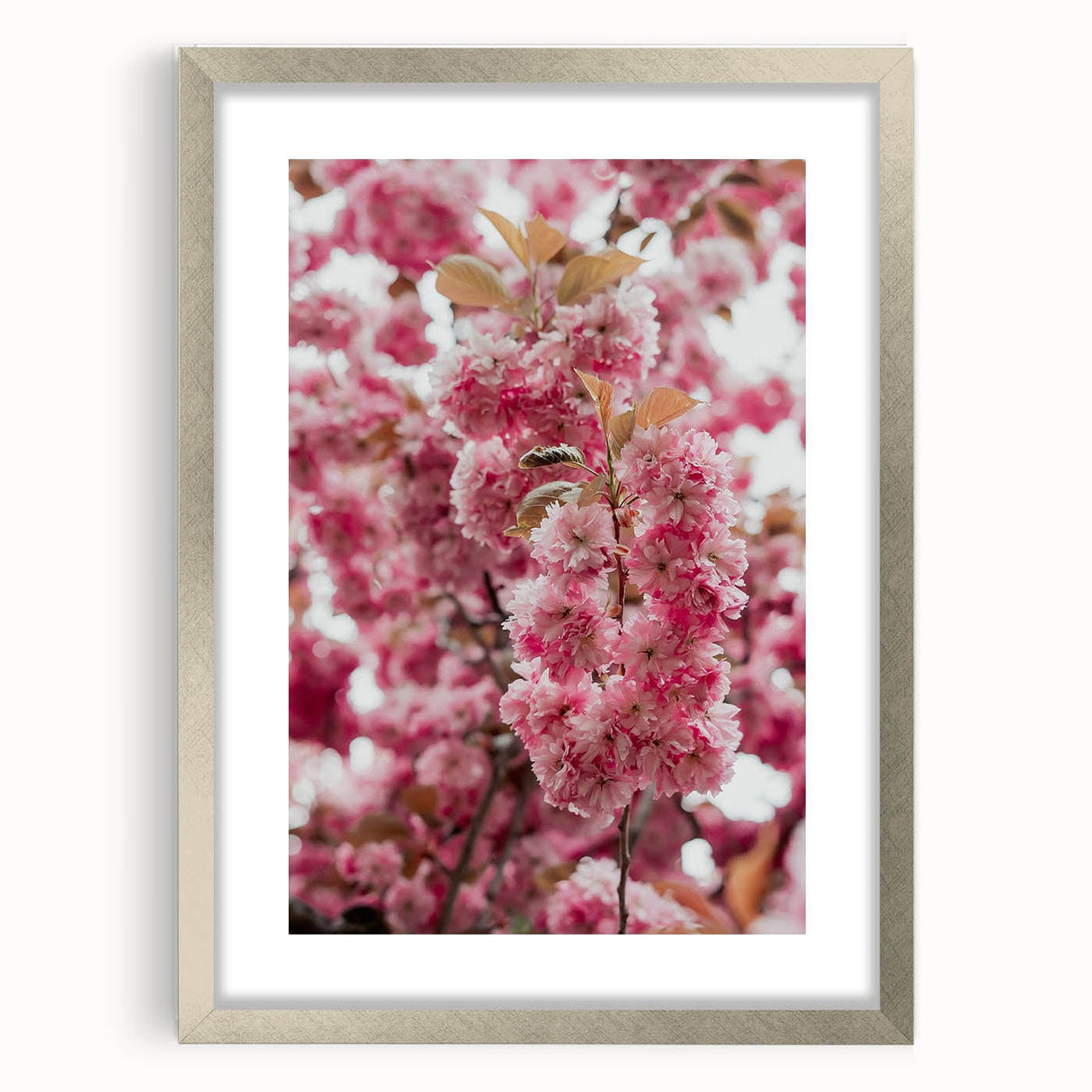 Textured abstract art print featuring swirling spring hues on a silver-framed canvas, ideal for bedroom ambiance.