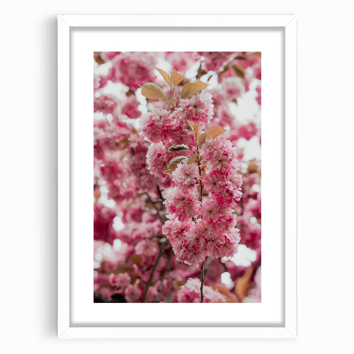 Abstract art print featuring swirling pastel hues on a white framed canvas, suitable for bedroom or dining room decor.